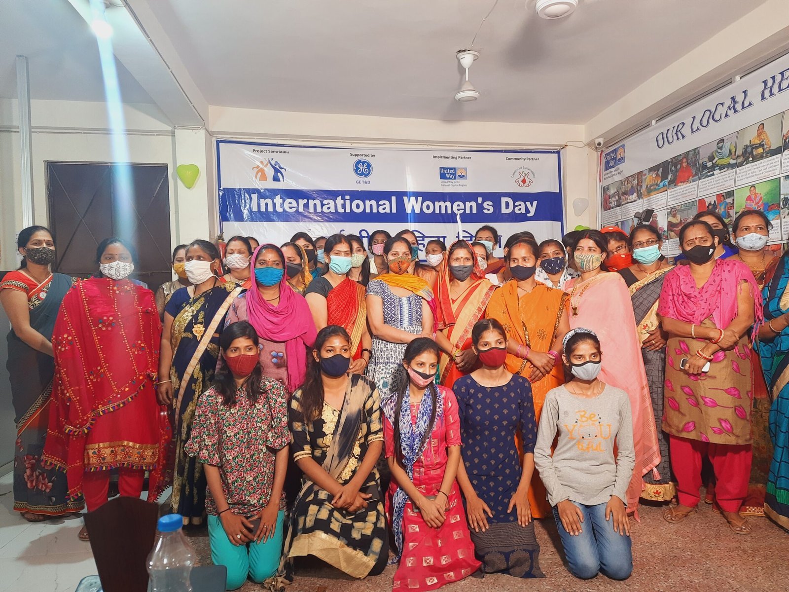Women and young people gathered at a CWS community programme